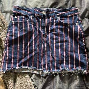 Super stretch size 4 American Eagle denim skirt. With red and white stripes